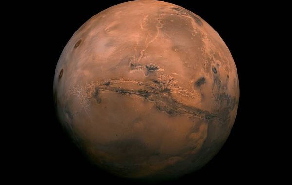 Цианобактерии способны жить внутри зерен пыли на Марсе
<p>